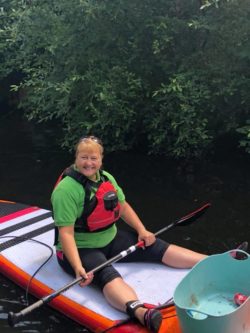 Alison on her paddle board