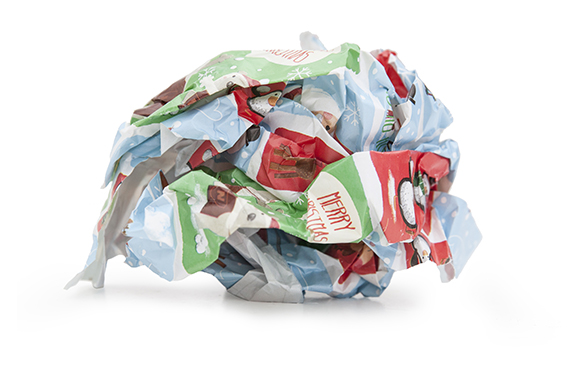 A scrunched up ball of Christmas wrapping paper