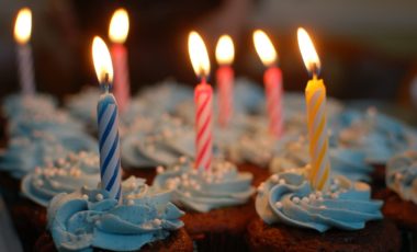 Cupcakes with lit candles