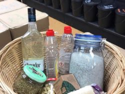 Basket of shopping in reusable bottles and jars