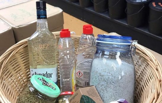 Basket of shopping in reusable bottles and jars