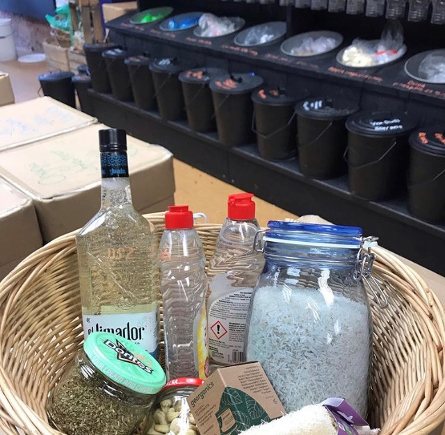 Basket of shopping in reusable bottles and jars