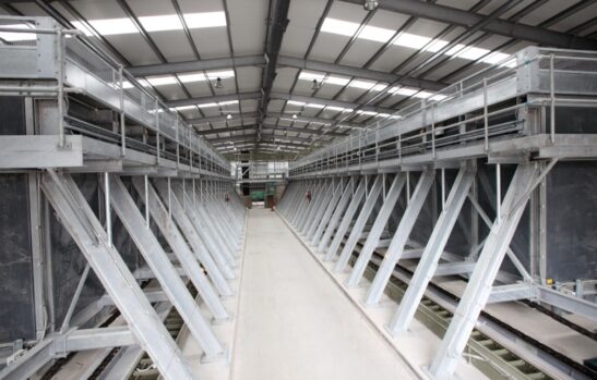 Two rows of In Vessel Composting machines
