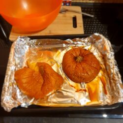 Baked pumpkin on a baking tray