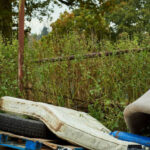 Fly tipped waste on a country road