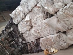 material components from mattresses baled into blocks and stacked