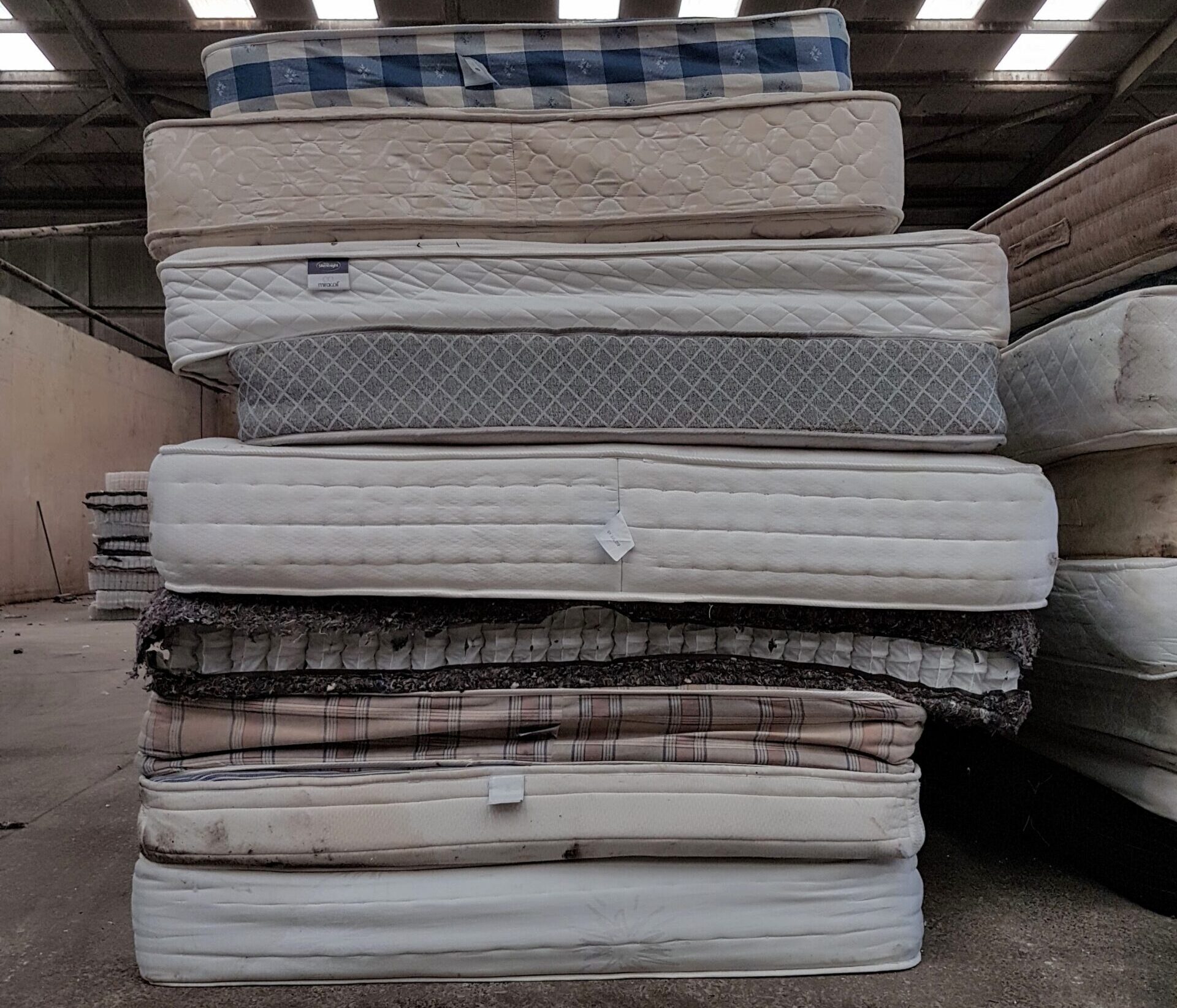 Pile of mattresses at the recycling facility