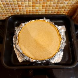 pumpkin mixture in a pie crust