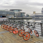View across Salford Quays, Manchester with hire bikes