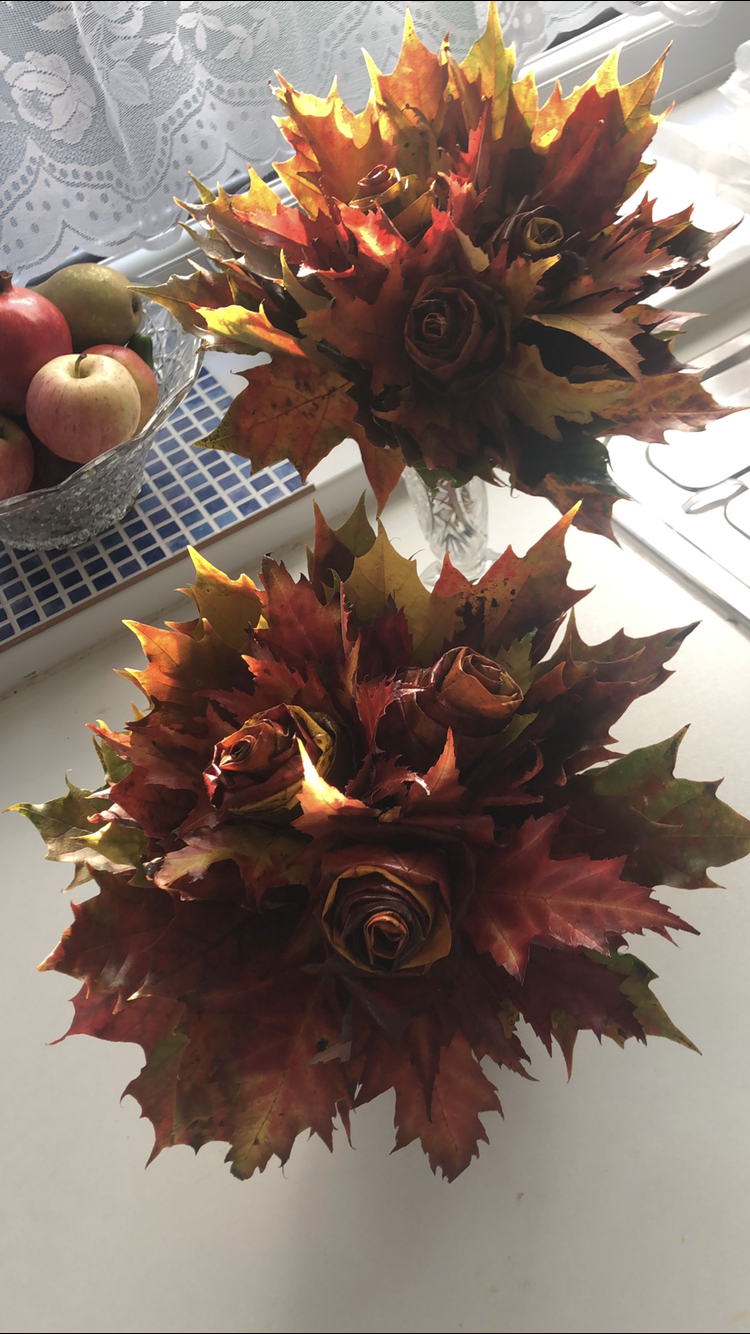 a bunch of flowers made with maple leaves