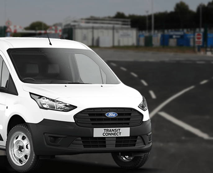 image of a white van at a recycling centre