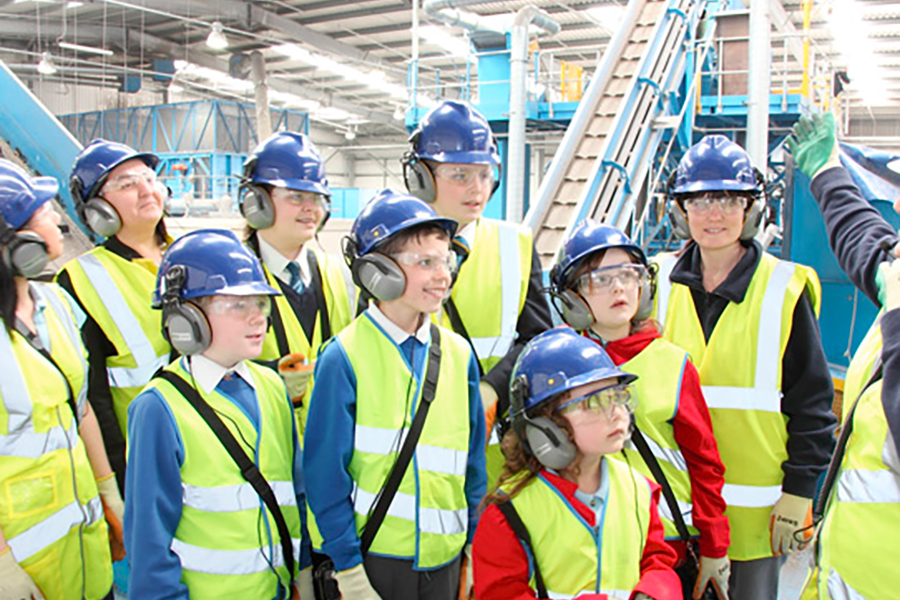 School children learning about a recycling centre